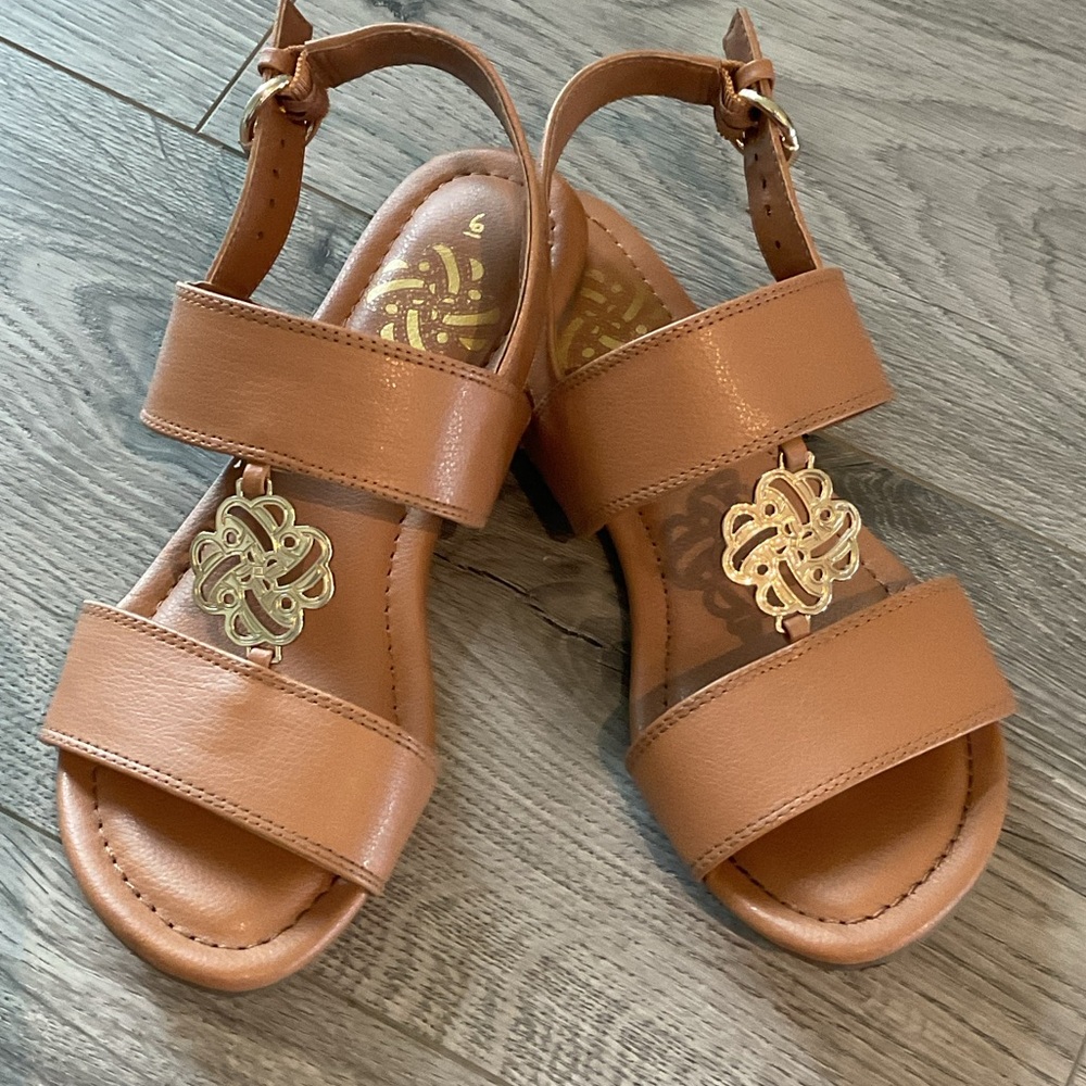 Sam and Libby slingback flats with padded soul and gold accents.